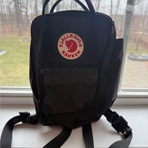 Fjallraven Kanken Mini Backpack in Black with Red Logo
